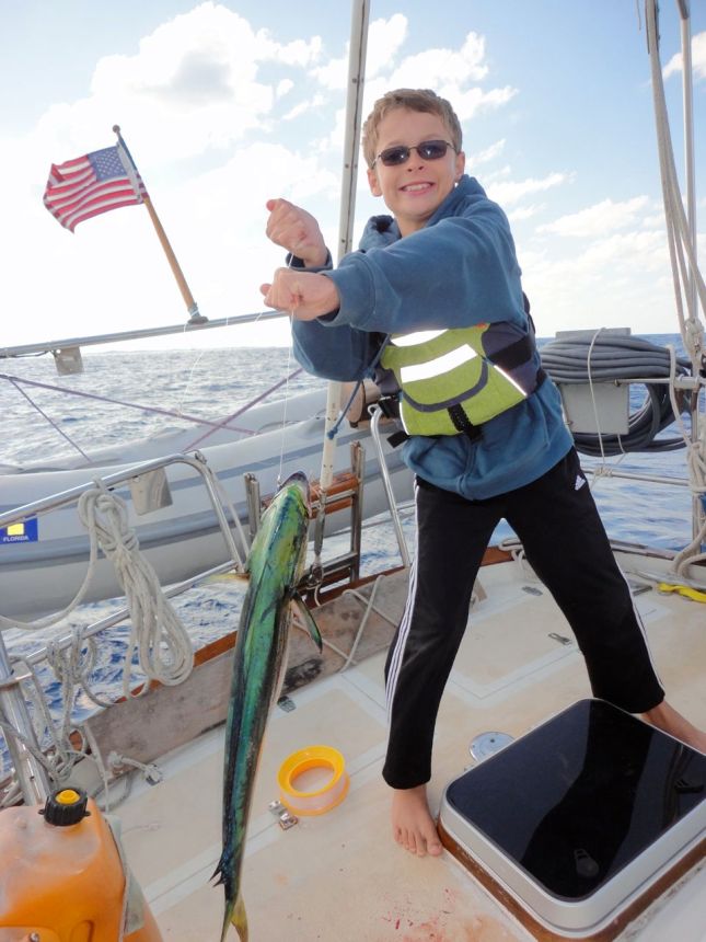 Zach catches his third mahi-mahi while crossing the Exuma Sound from Cat Island